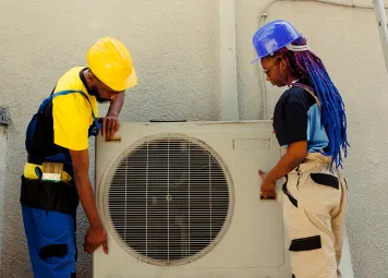 HVAC engineer checking refrigerant gas levels on commercial AC system Deira Dubai