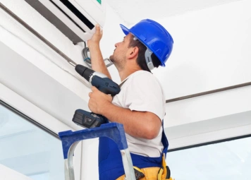 Professional HVAC contractor installing a modern HVAC system