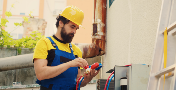 Split AC indoor unit being cleaned and serviced by Eagles Crew technician Deira Dubai