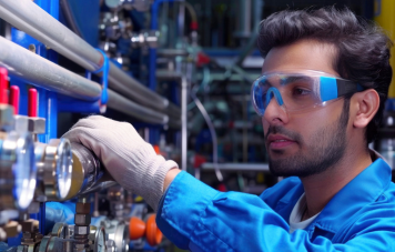 Licensed plumber repairing burst pipe in residential apartment Deira Dubai