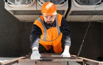 HVAC engineer inspecting ventilation system Dubai